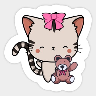 Cute tabby cat holds a teddy bear Sticker